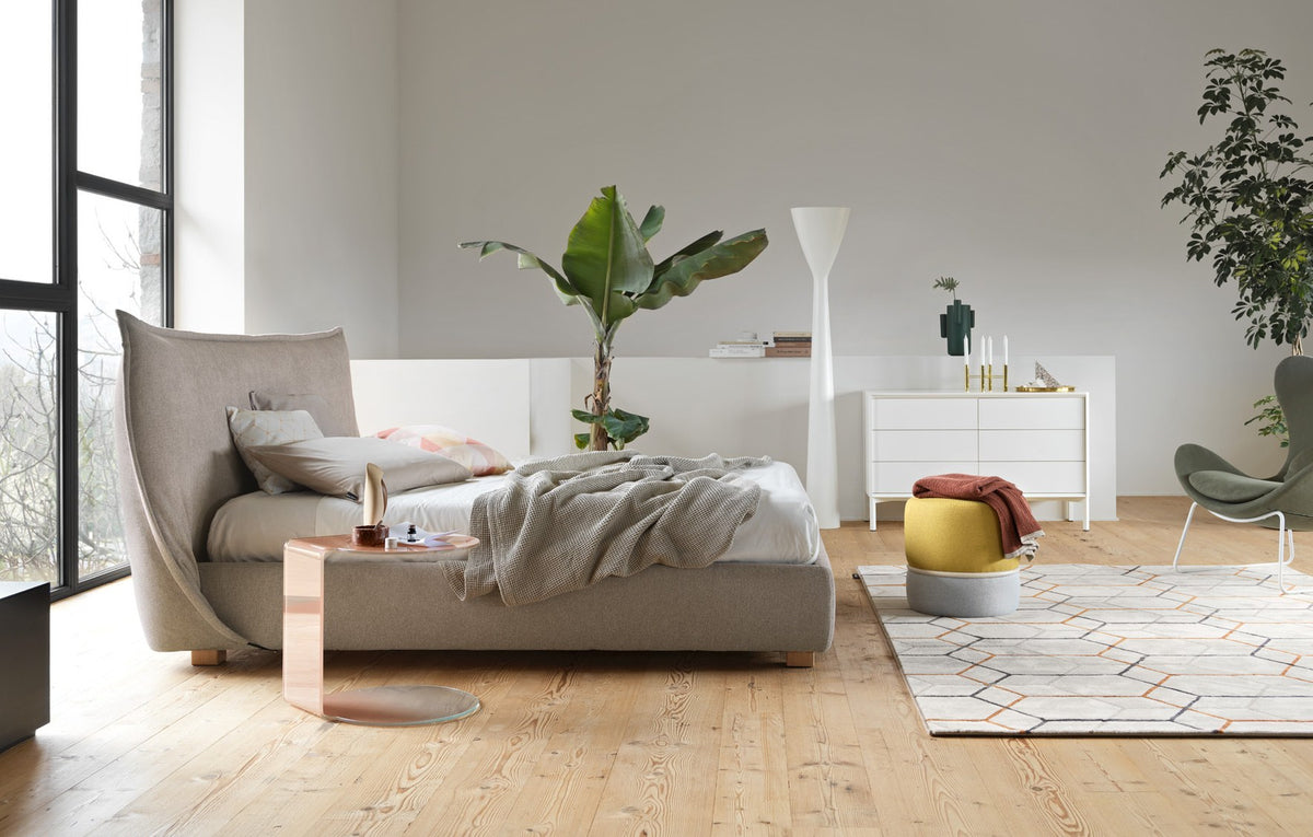 Softly bed in a room setting